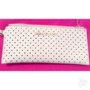 Michael Kors white pouch.